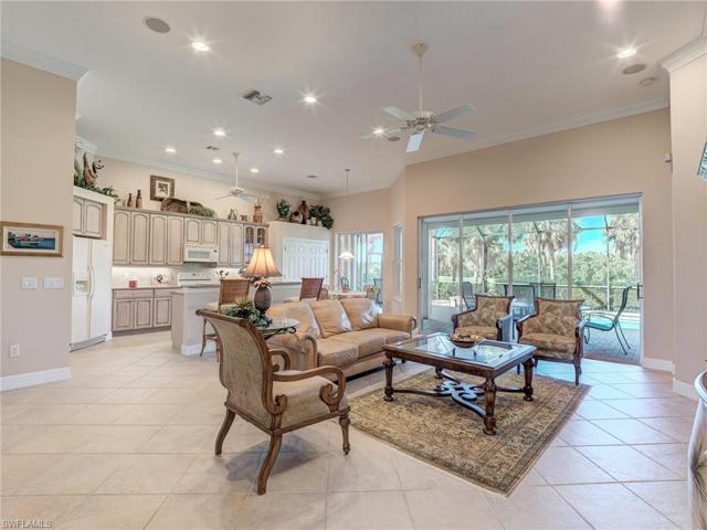 Open living area and kitchen with eat-in area.