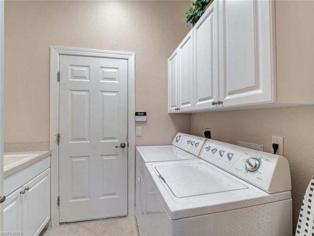 Laundry room between kitchen and garage