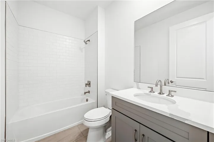 Guest bathroom with tub and shower combo
