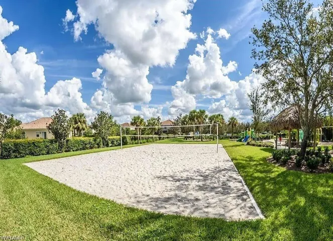 View of property's community featuring a yard, volleyball court, and a gazebo