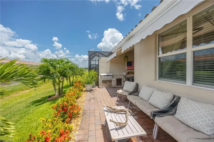 View of patio featuring area for grilling