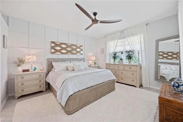 Bedroom featuring baseboards and a ceiling fan