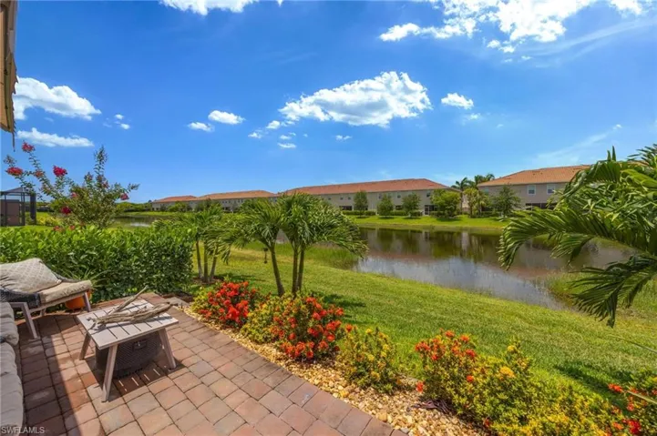 View of patio / terrace with a water view