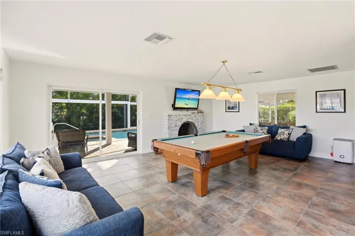 Playroom with pool table