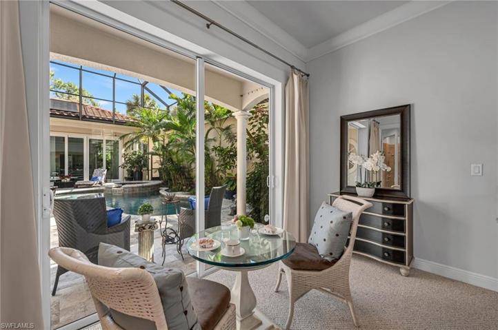 The sliding glass doors open out to the pool and garden.  What a way to have your morning coffee!