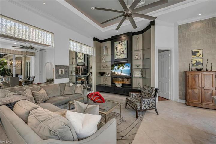 The custom media wall was thoughtfully designed for sculpts, art, TV, and a fireplace for added ambience.