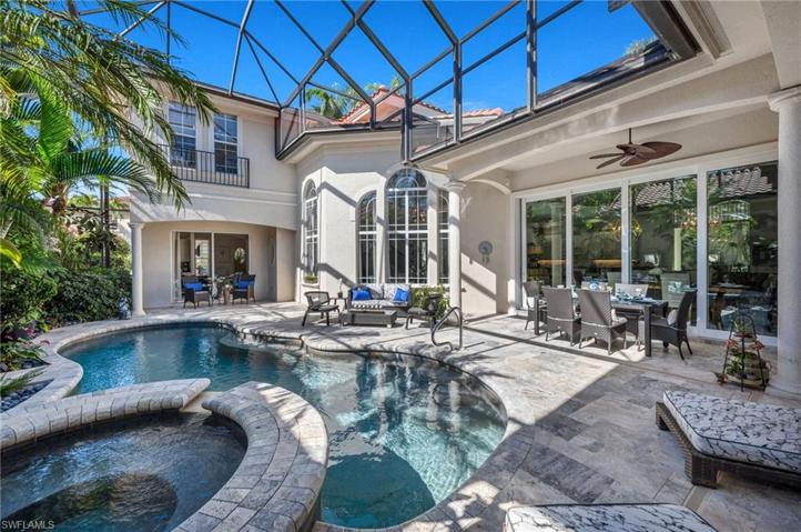 This courtyard pool residence is the perfect backdrop for relaxing days...