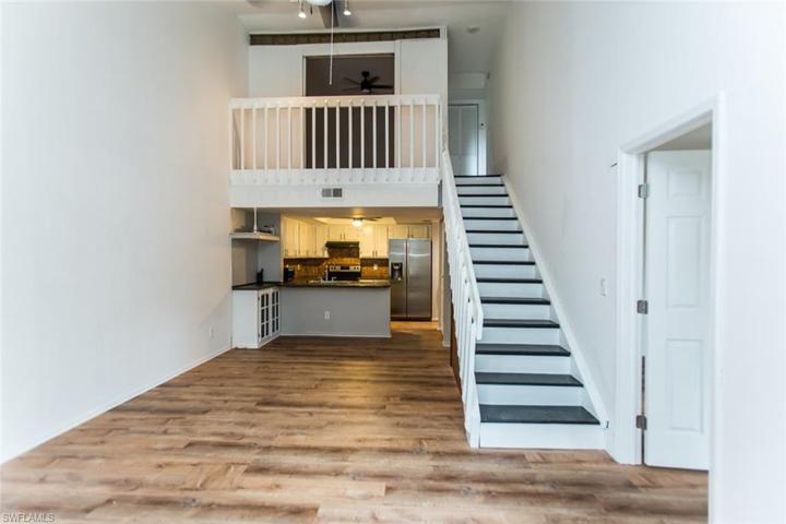 open plan living Dining leading to kitchen stairs to flex room guest bath and guest bed