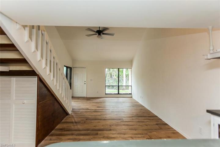 living looking out to wooded area