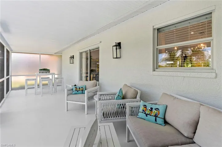 Sunroom / solarium with an outdoor hangout area