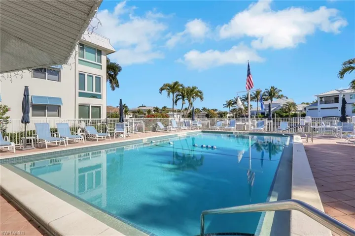 Community pool featuring a patio area