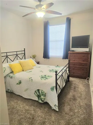 Spacious guest bedroom with natural light and extra closet space