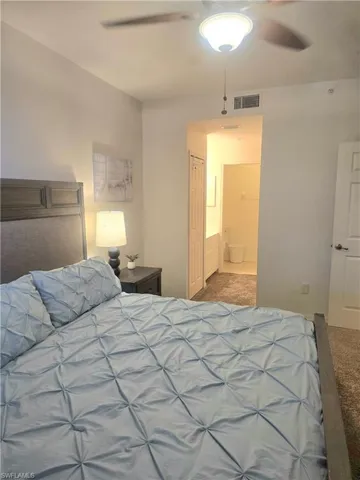 Primary Bedroom with en suite bathroom and walk in closet