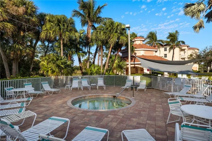 Community hot tub with bathrooms near unit's building