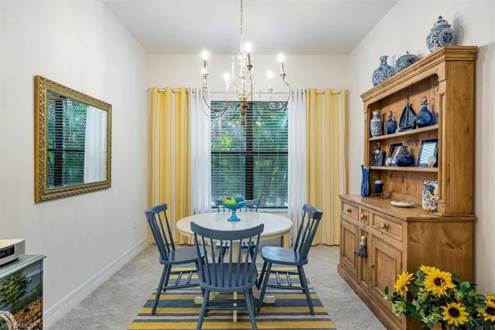 Dining room with a notable chandelier