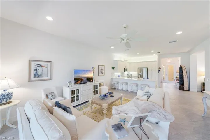 Living room with sink and ceiling fan