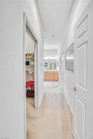 Hall featuring baseboards
