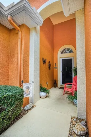 Property entrance with stucco siding