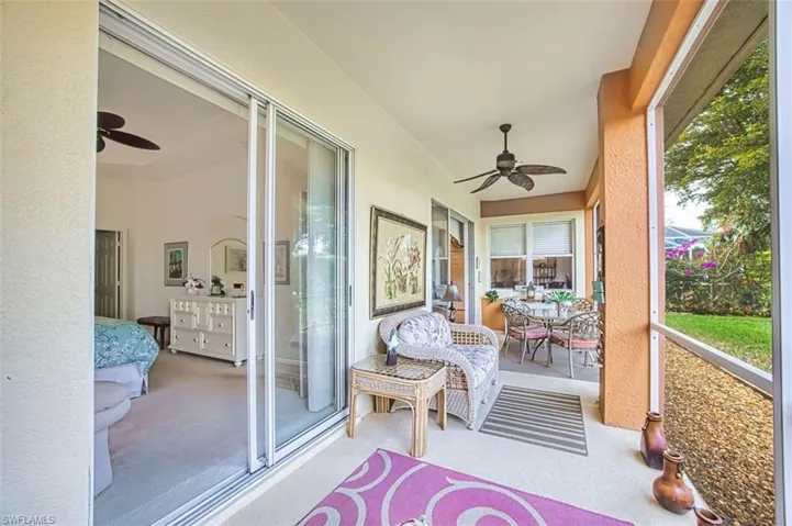 Sunroom / solarium with ceiling fan, outdoor dining area, and healthy amount of natural light