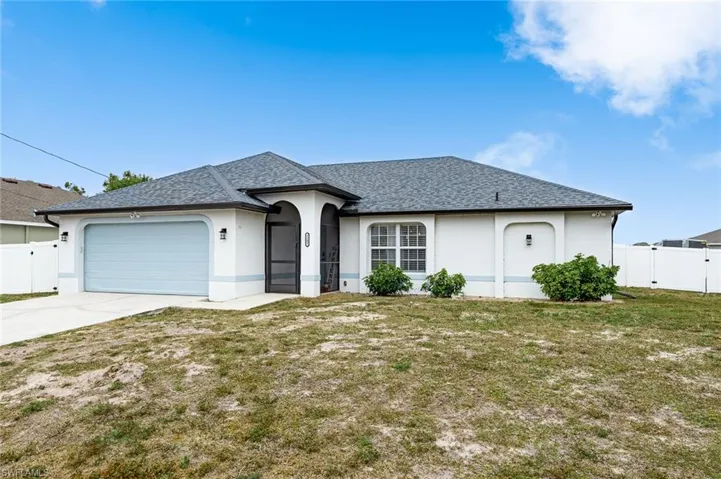 Single story home with a gate, stucco siding, roof with shingles, driveway, and a garage