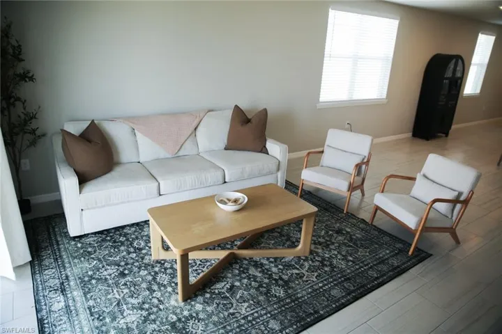 Living room featuring baseboards