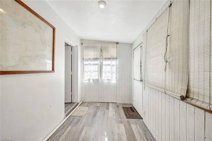 Unit One Sunroom with lots of natural light.