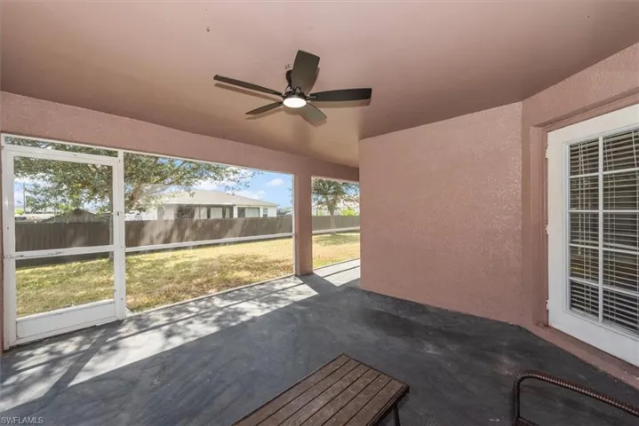 View of patio with a ceiling fan