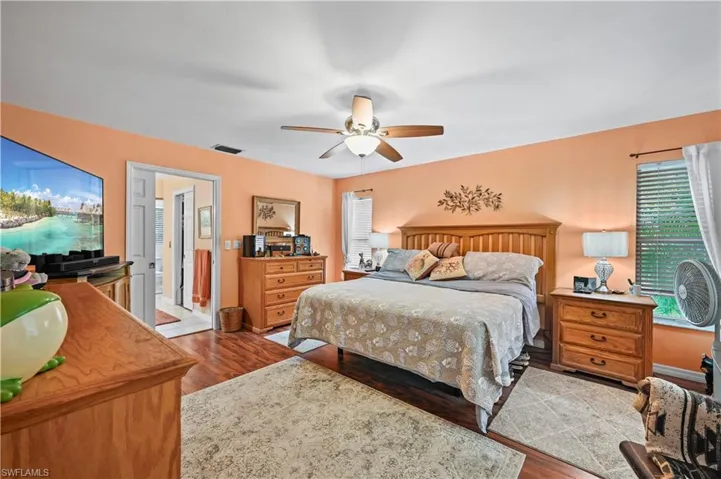 Bedroom featuring light wood-type flooring and ceiling fan