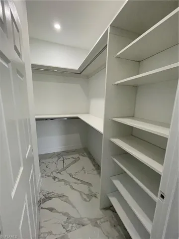 Walking closet- master bedroom.