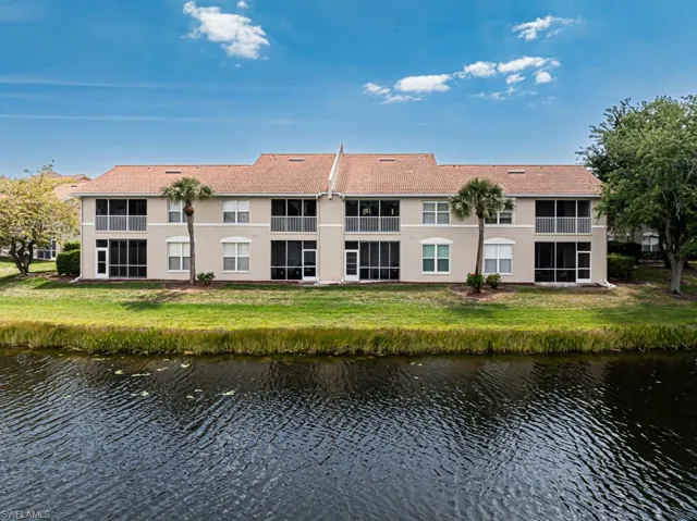 View of property featuring a water view