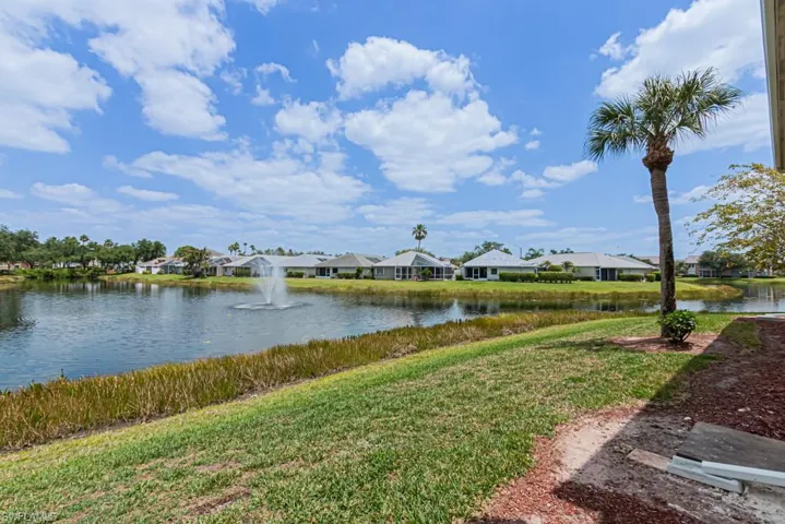 Property view of water with a residential view