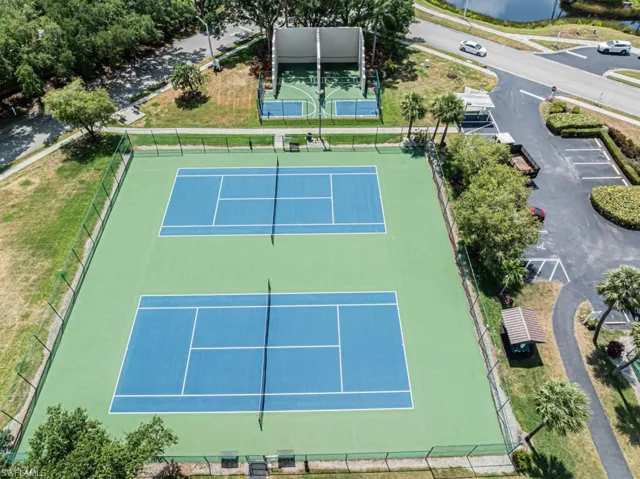 View of tennis court with fence