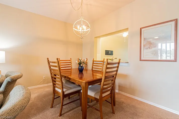Dining space with featured lighting