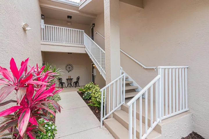 View of exterior entry and landscaping
