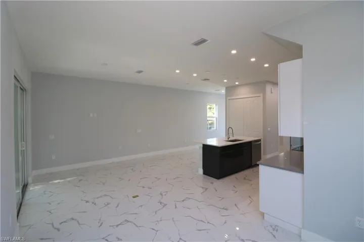 Kitchen with dishwasher and sink