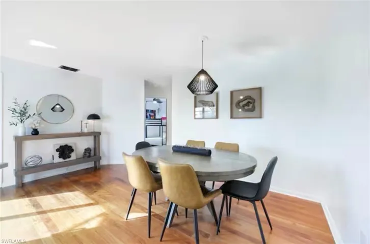 Dining area featuring light wood-type flooring