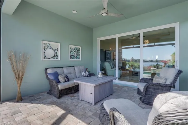 View of patio / terrace with an outdoor lounge area and a ceiling fan