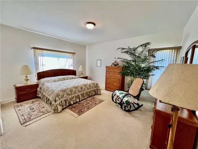 Second primary bedroom with private ensuite bathroom.