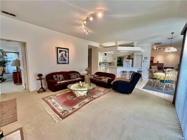 Family room featuring track lighting.
