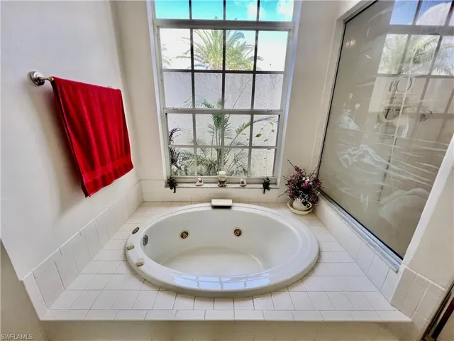 Jetted tub overlooking the atrium.