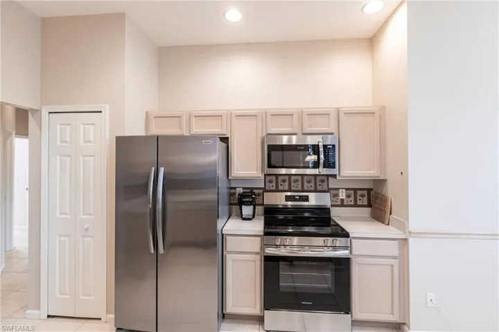 Kitchen featuring appliances with stainless steel finishes