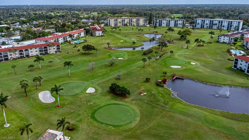 Aerial view of a local golf course and a large body of water
