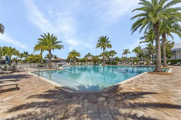 Community pool featuring a patio area