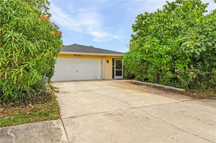 View of front of home with a garage