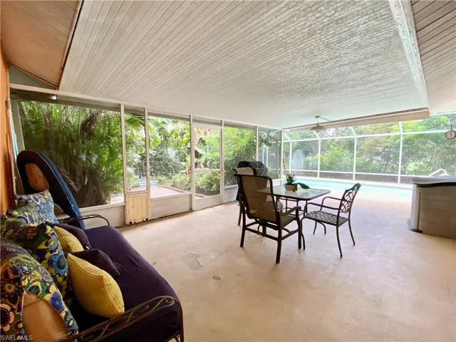 Sunroom / solarium with a wealth of natural light