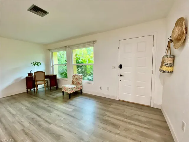 Foyer featuring hardwood / wood-style floors