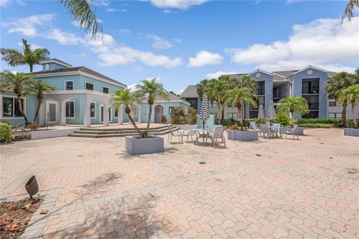 Rear view of house featuring a patio area