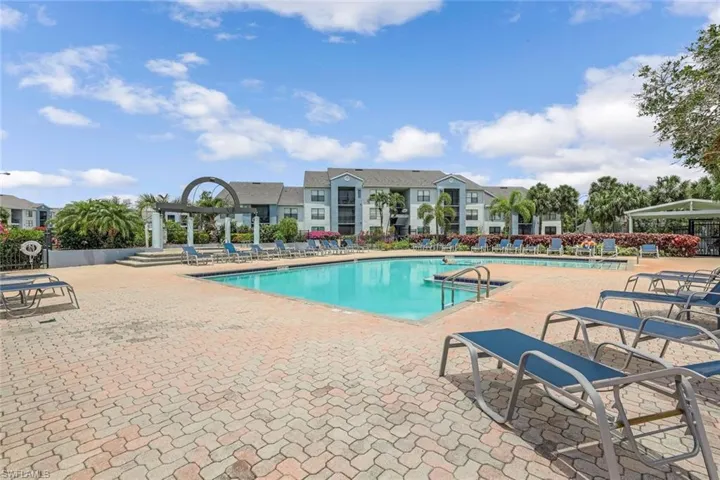View of swimming pool with a patio