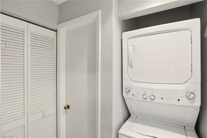 Laundry room with stacked washer / drying machine