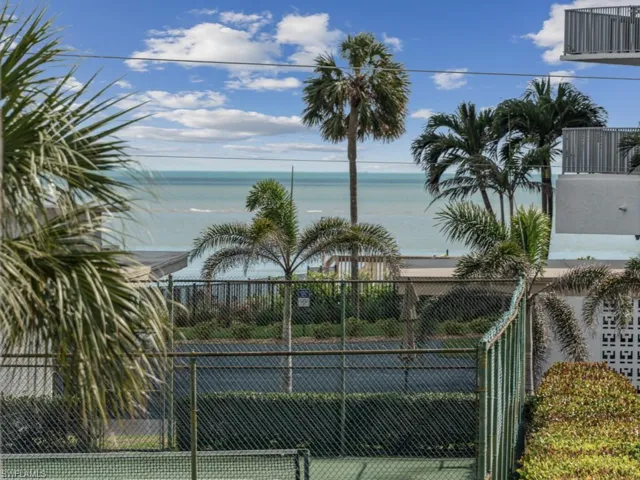 Property view of water with fence